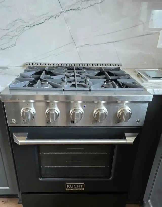 Gas range connected and set in a new kitchen